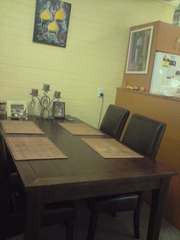 Dining table with leather chairs  